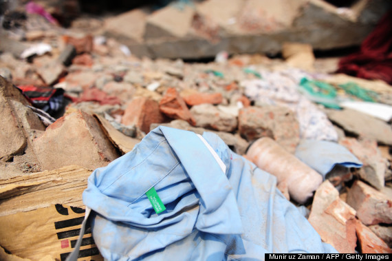 A Benetton label lies on a collapsed garment in the rubble of Rana Plaza, Dhaka, April 2013